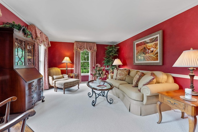 carpeted living room with ornamental molding