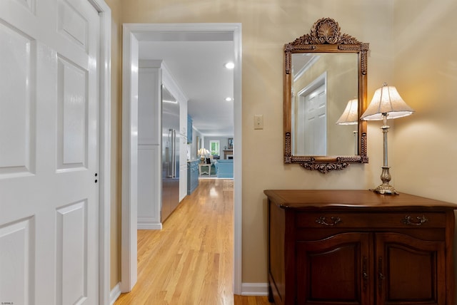 hallway featuring light wood-type flooring