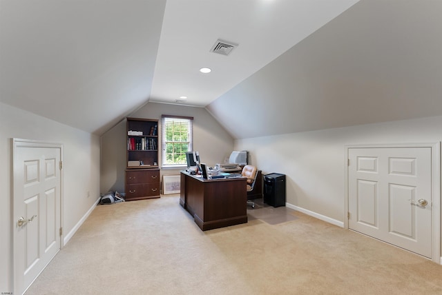 office area with light carpet and lofted ceiling