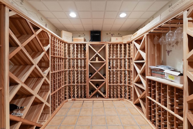 wine area featuring tile patterned flooring