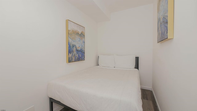 bedroom featuring wood-type flooring