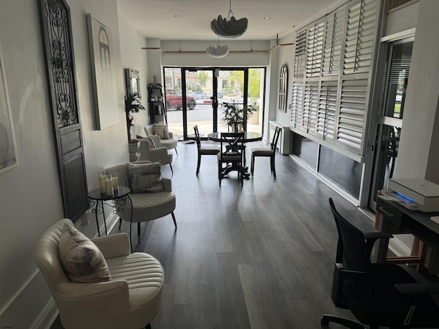 dining area with hardwood / wood-style flooring