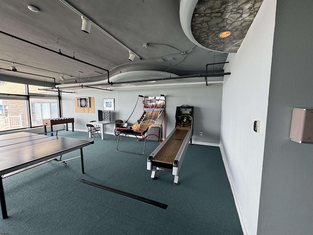 playroom featuring carpet flooring and rail lighting