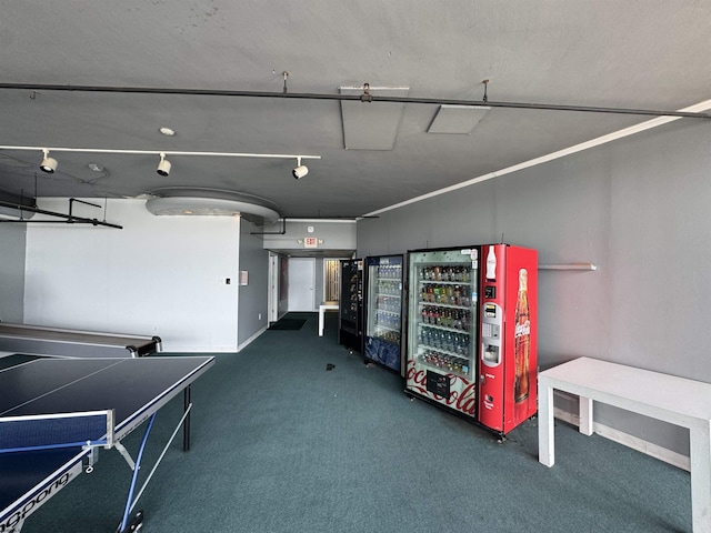 interior space featuring dark colored carpet