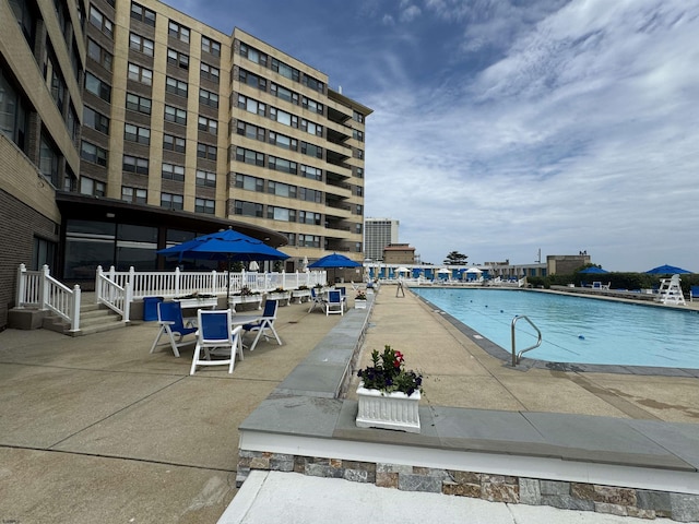 view of pool with a patio