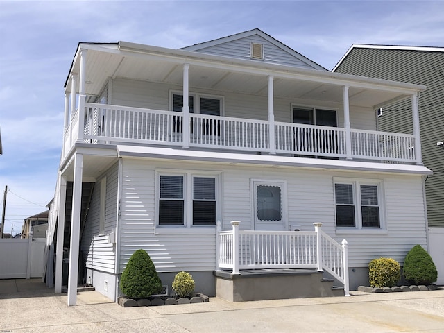 view of front of property with a balcony