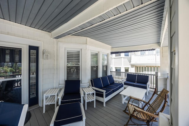 wooden deck with outdoor lounge area