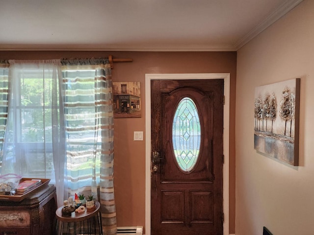 entryway featuring ornamental molding