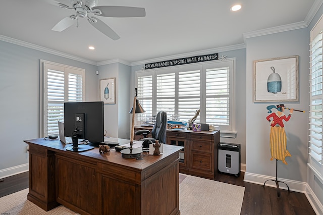 home office with ceiling fan, crown molding, and dark wood-type flooring