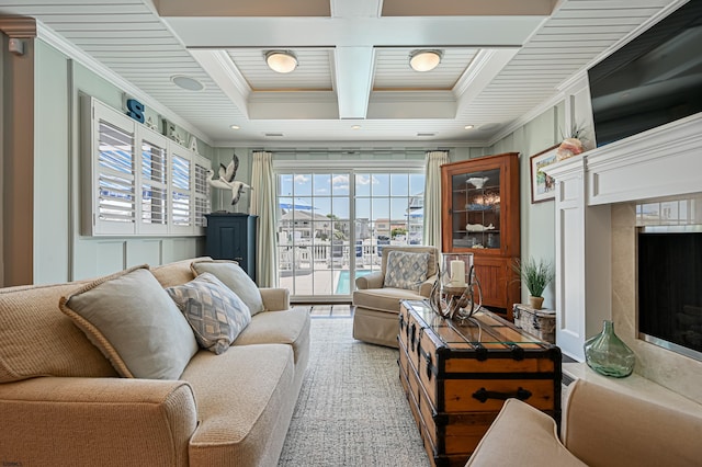 living room with beamed ceiling, coffered ceiling, and ornamental molding