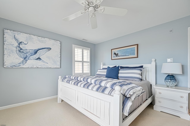 bedroom with light colored carpet and ceiling fan