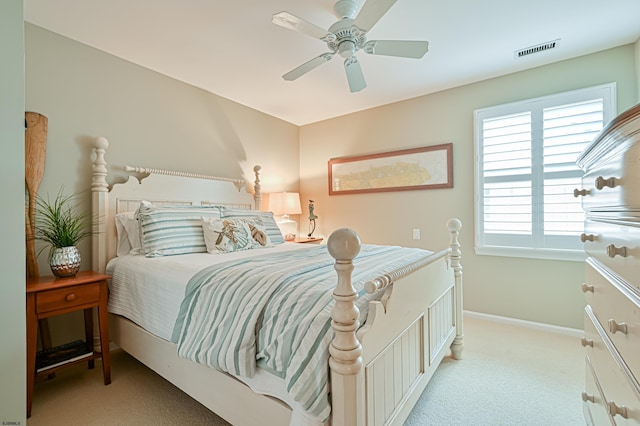 bedroom with light colored carpet and ceiling fan