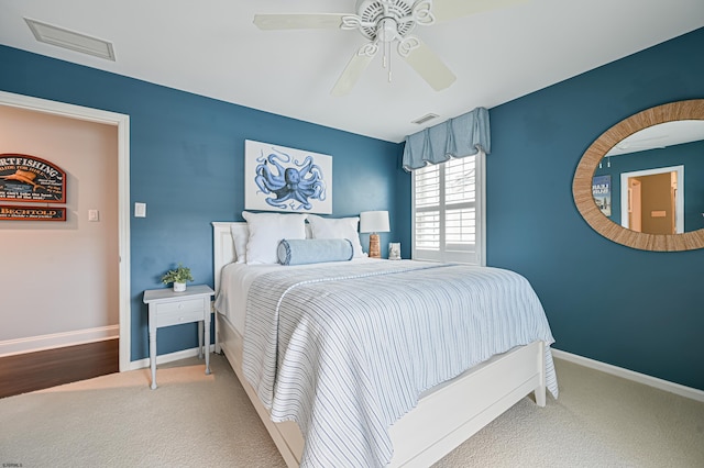 bedroom featuring ceiling fan and carpet floors