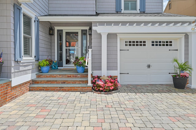 entrance to property featuring a garage