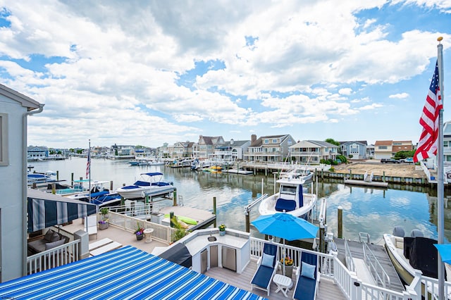 dock area featuring a water view