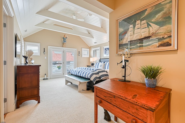 carpeted bedroom with lofted ceiling with beams and access to exterior