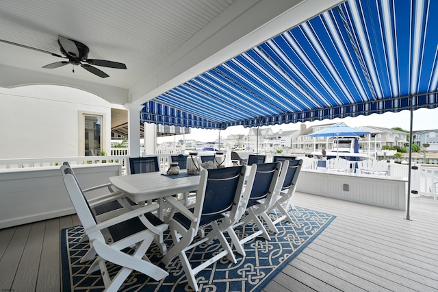 wooden deck with ceiling fan