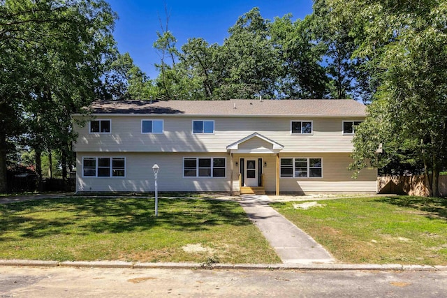 view of front of home with a front yard