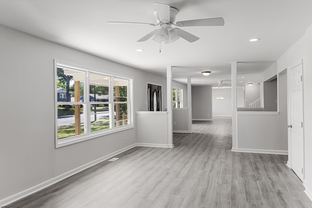 spare room with ceiling fan and light hardwood / wood-style floors