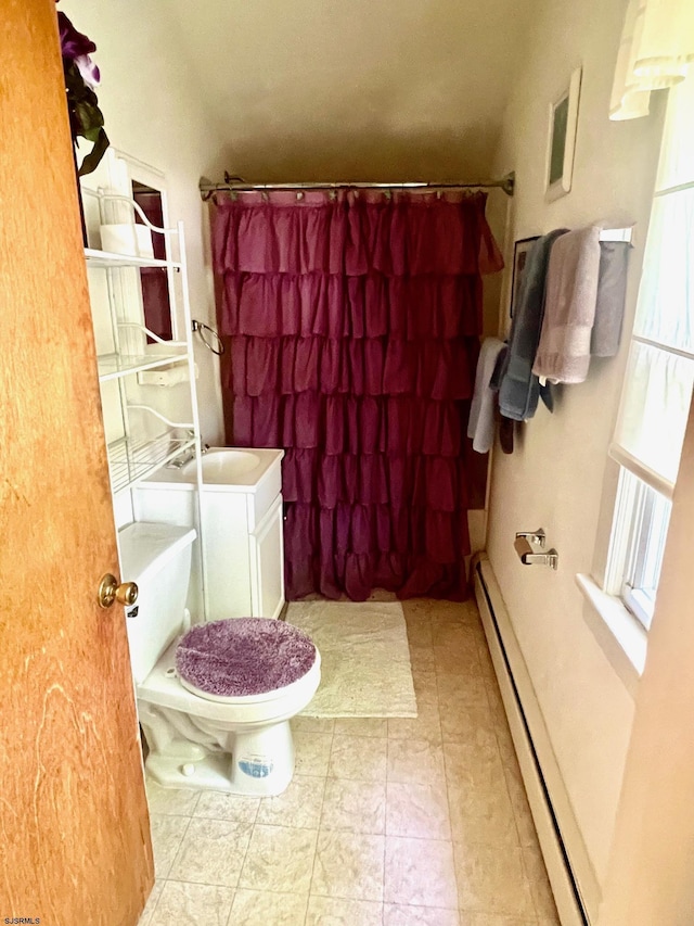 bathroom featuring vanity, a baseboard radiator, toilet, and curtained shower