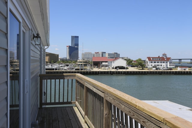 balcony featuring a water view