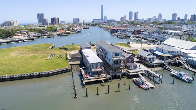 birds eye view of property featuring a water view