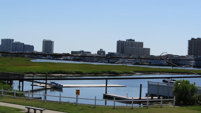 property view of water with a dock