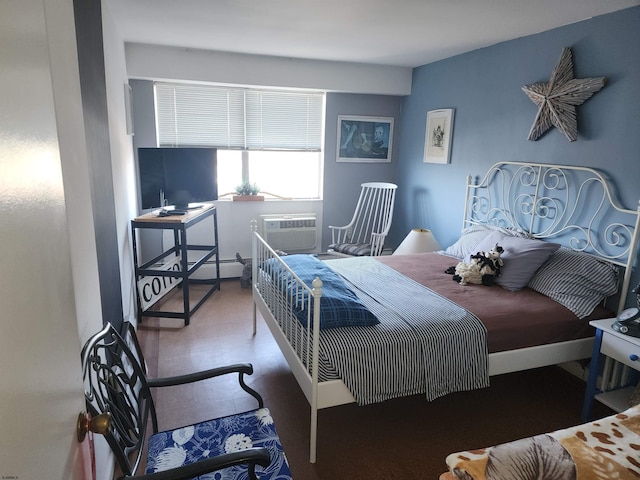 bedroom with a wall mounted AC