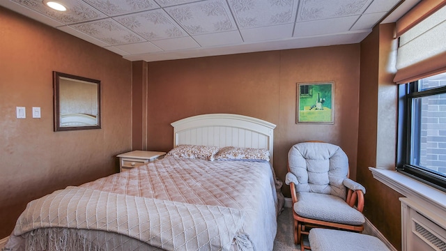 bedroom with multiple windows