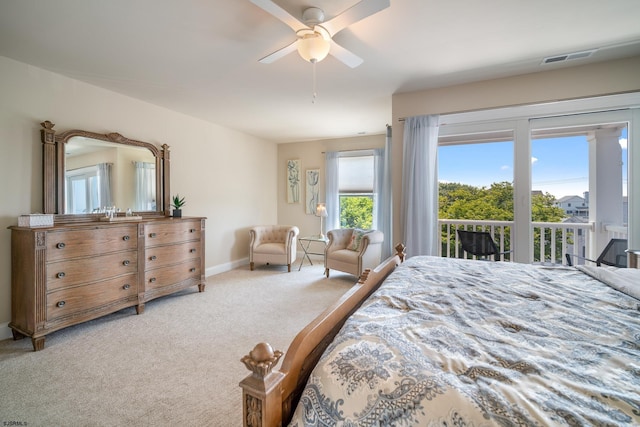 carpeted bedroom with access to outside and ceiling fan