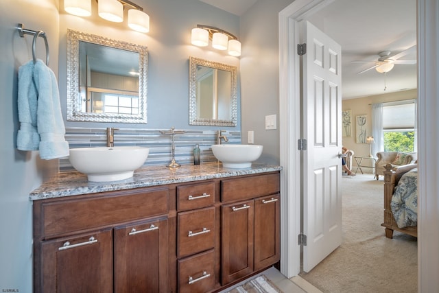 bathroom featuring vanity and ceiling fan