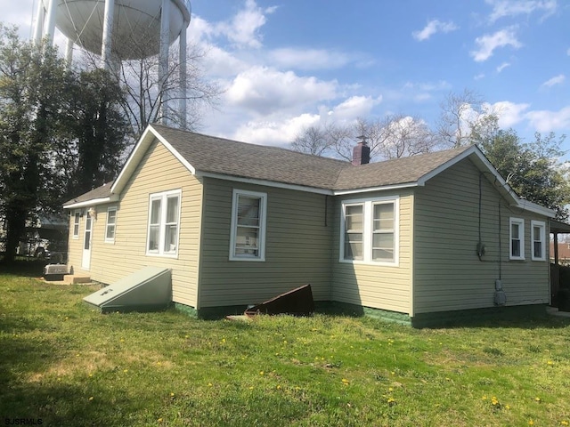 view of home's exterior featuring a lawn