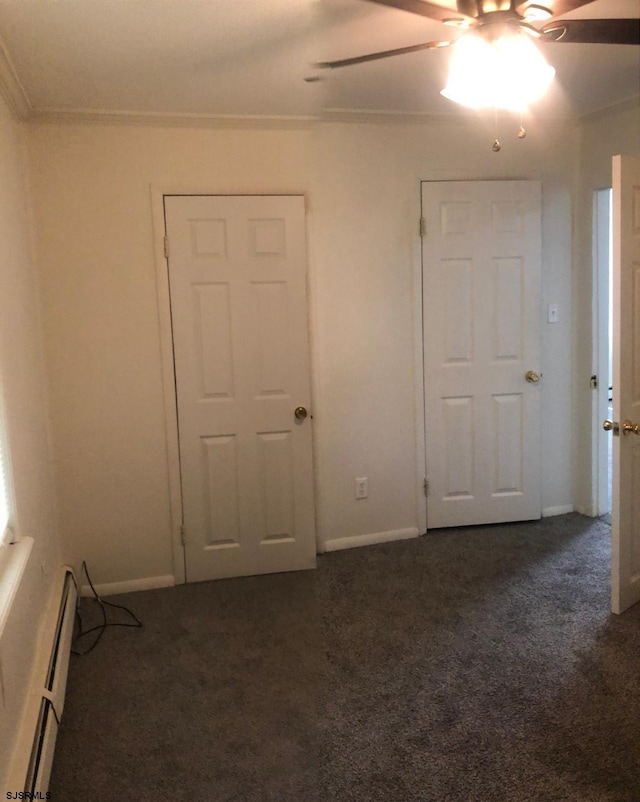 unfurnished room with ornamental molding, ceiling fan, dark carpet, and baseboard heating