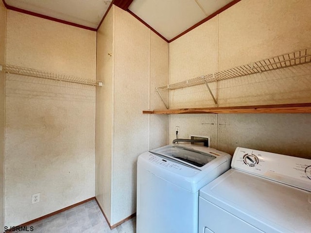 laundry room with independent washer and dryer