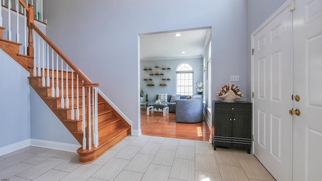 foyer entrance with ornamental molding