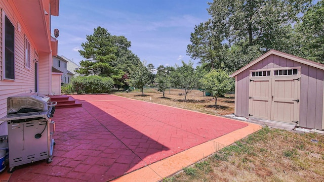 view of patio / terrace with a shed