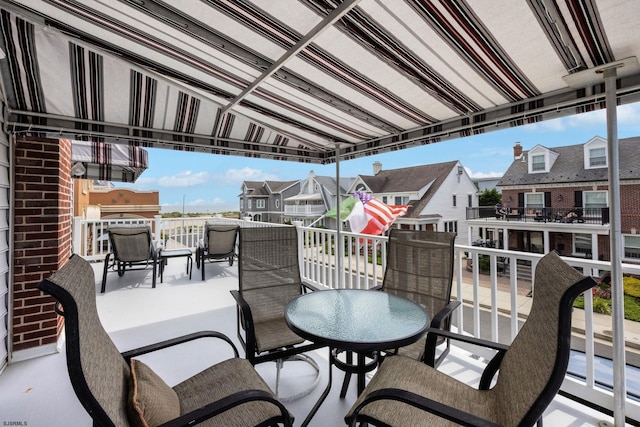 balcony featuring a residential view