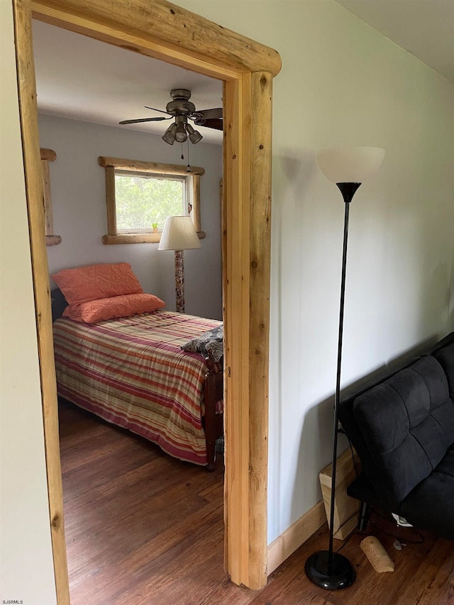 bedroom featuring ceiling fan and hardwood / wood-style floors