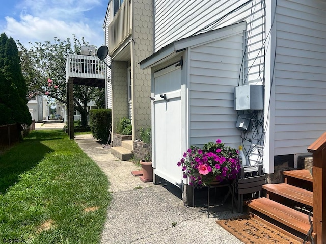 view of home's exterior with a balcony