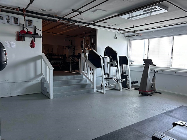 workout area featuring concrete floors