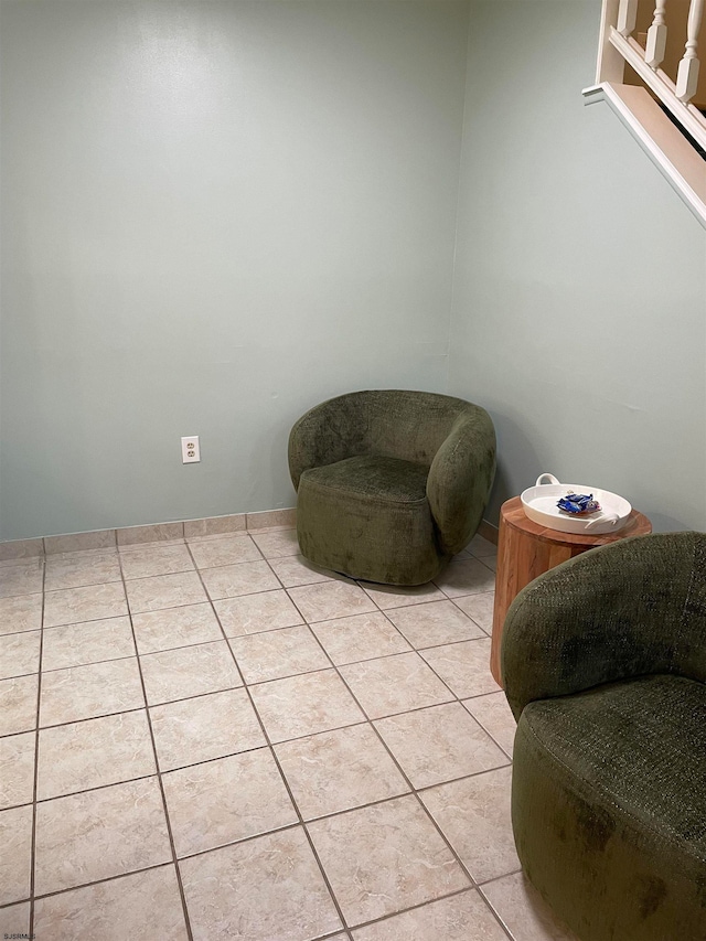 sitting room featuring tile patterned floors