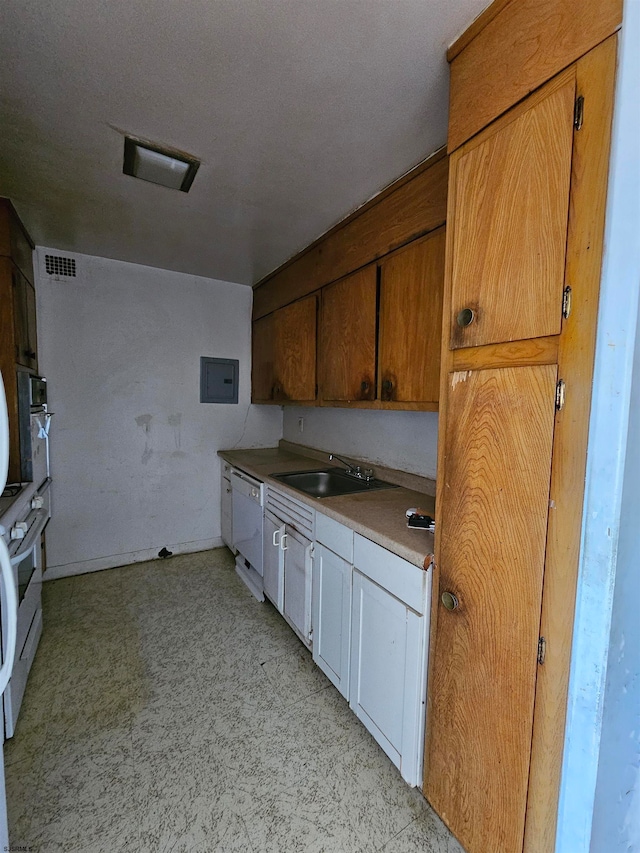 kitchen featuring sink, electric panel, and dishwasher