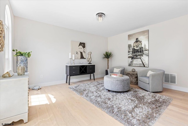 living area featuring light wood-type flooring