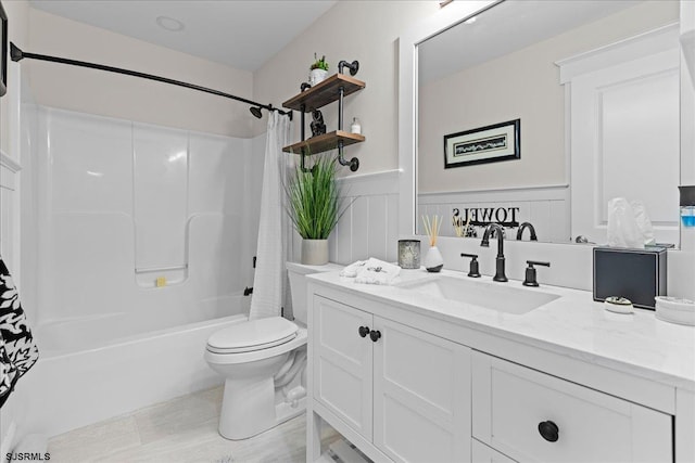 full bathroom with toilet, shower / bath combo with shower curtain, and vanity