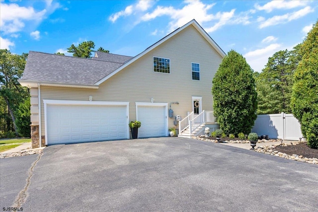 view of front of home featuring a garage