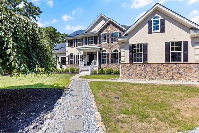 view of front of house with a front lawn