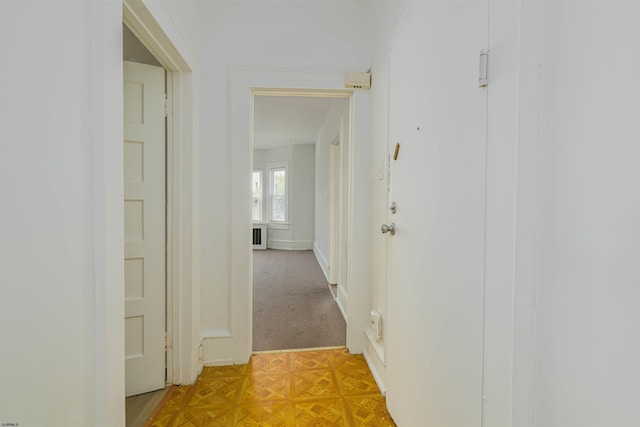 hallway with light parquet flooring