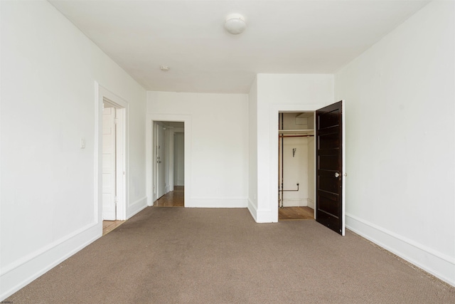 unfurnished bedroom with carpet