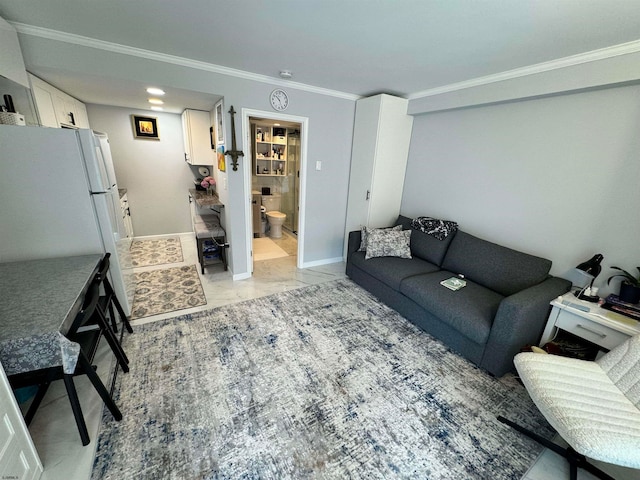 tiled living room with ornamental molding