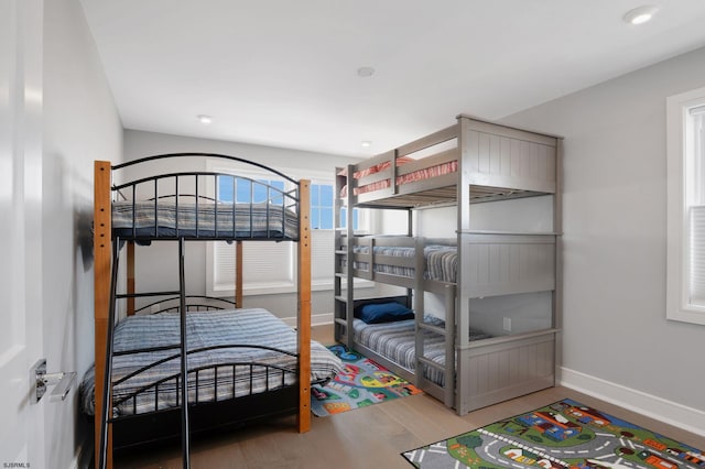 bedroom featuring wood-type flooring